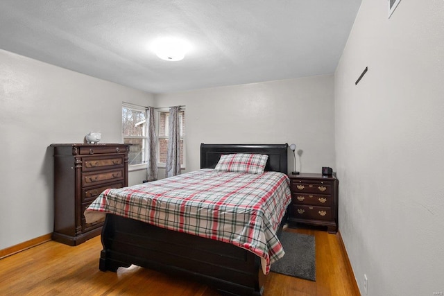 bedroom featuring light wood-type flooring