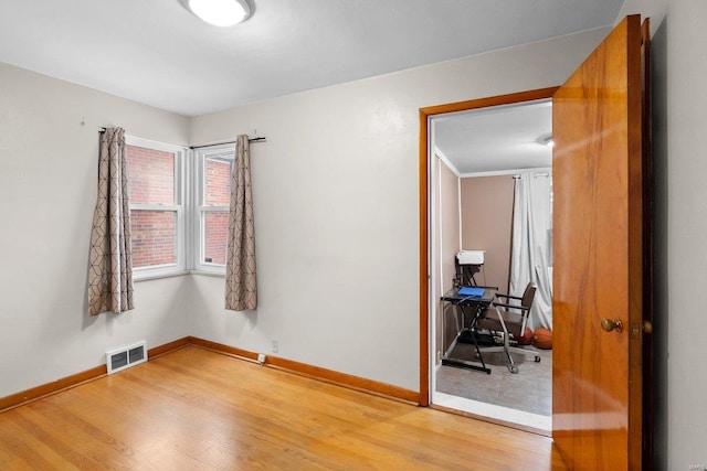 bedroom featuring hardwood / wood-style flooring