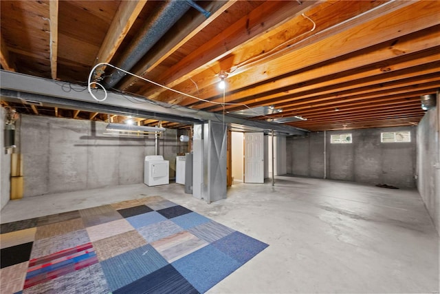 basement featuring separate washer and dryer