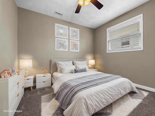 carpeted bedroom featuring ceiling fan