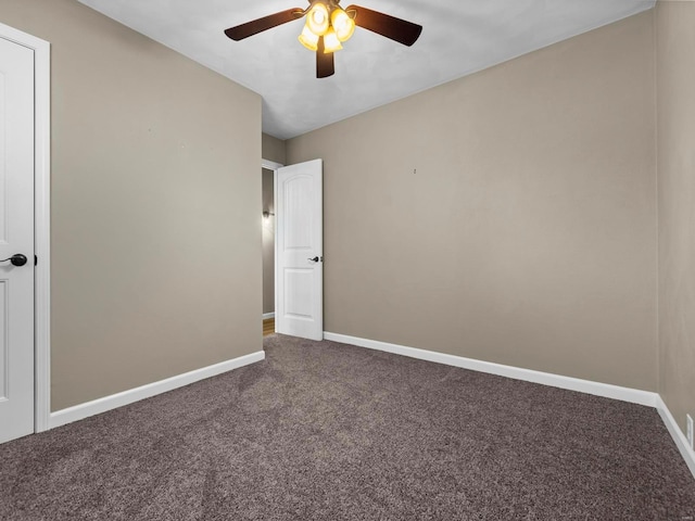 carpeted empty room with ceiling fan