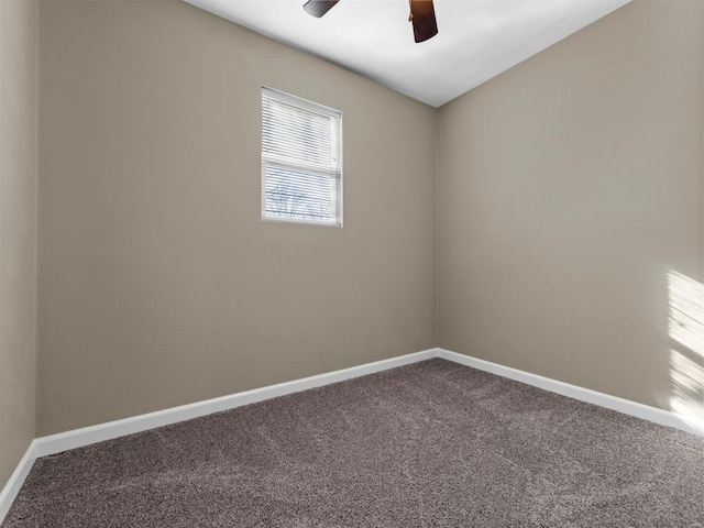 unfurnished room featuring carpet and ceiling fan