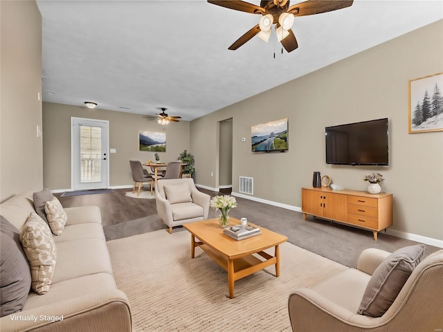 living room featuring ceiling fan