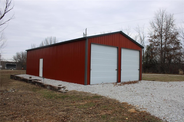 view of outdoor structure with a garage