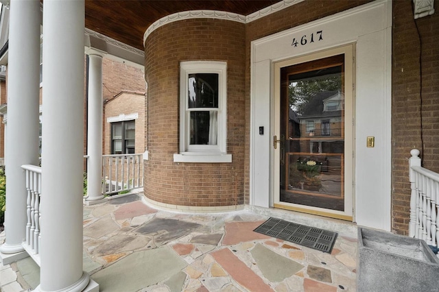 doorway to property featuring a porch