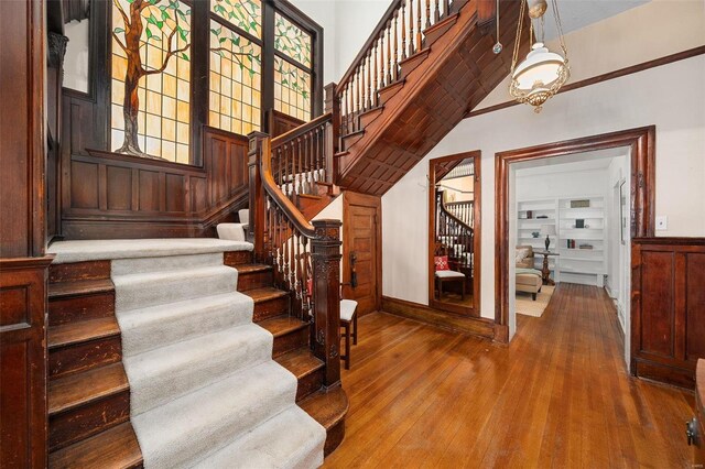 staircase featuring hardwood / wood-style floors