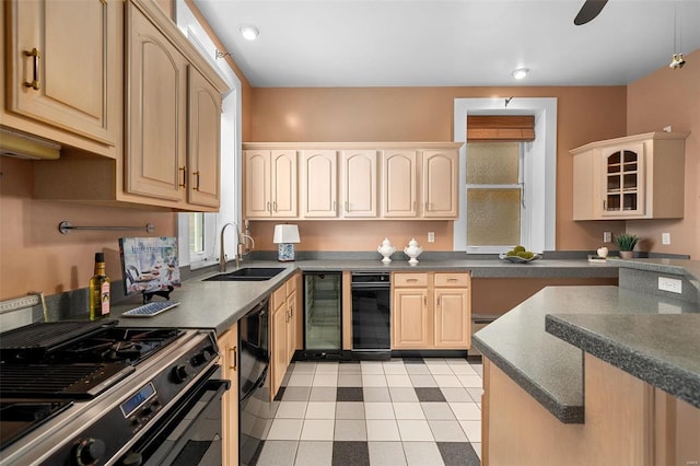 kitchen featuring light brown cabinets, black gas stove, sink, and wine cooler