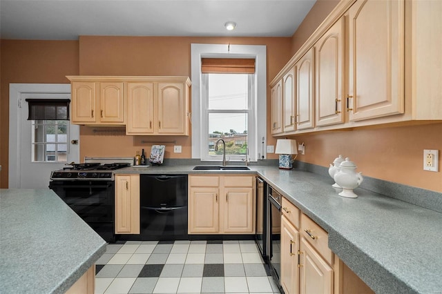 kitchen featuring black appliances, sink, and light brown cabinetry