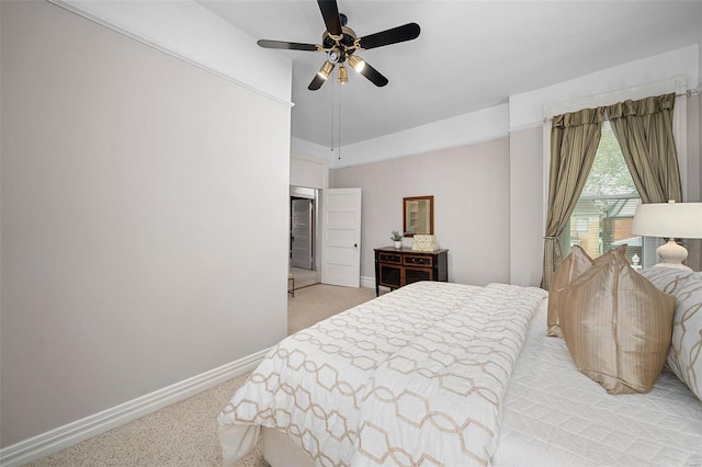 bedroom with ceiling fan and light colored carpet