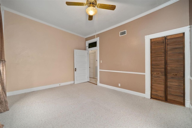 unfurnished bedroom with carpet floors, a closet, ceiling fan, and ornamental molding