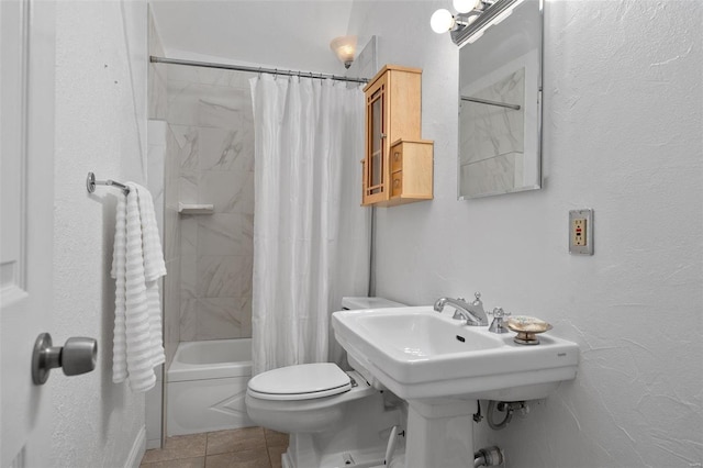 bathroom featuring tile patterned flooring, toilet, and shower / bathtub combination with curtain