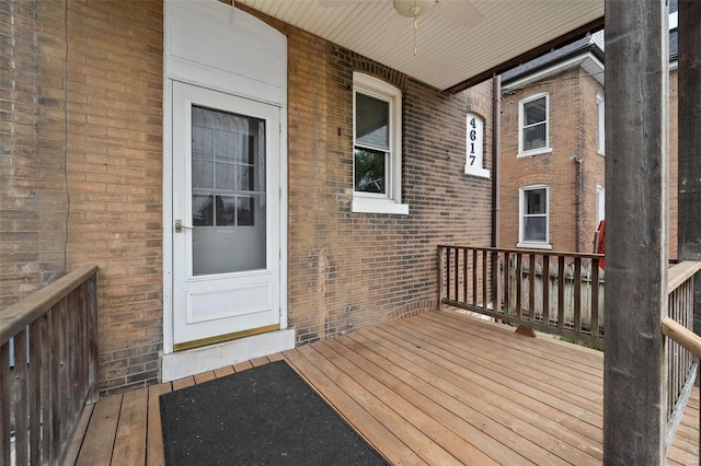 wooden terrace with ceiling fan