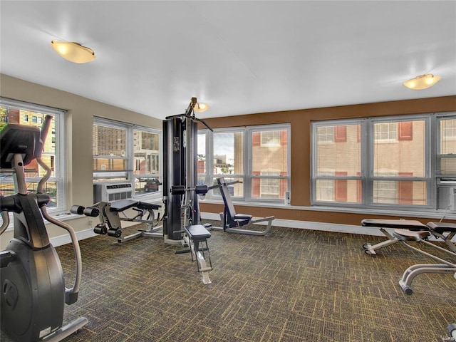 workout area with dark carpet