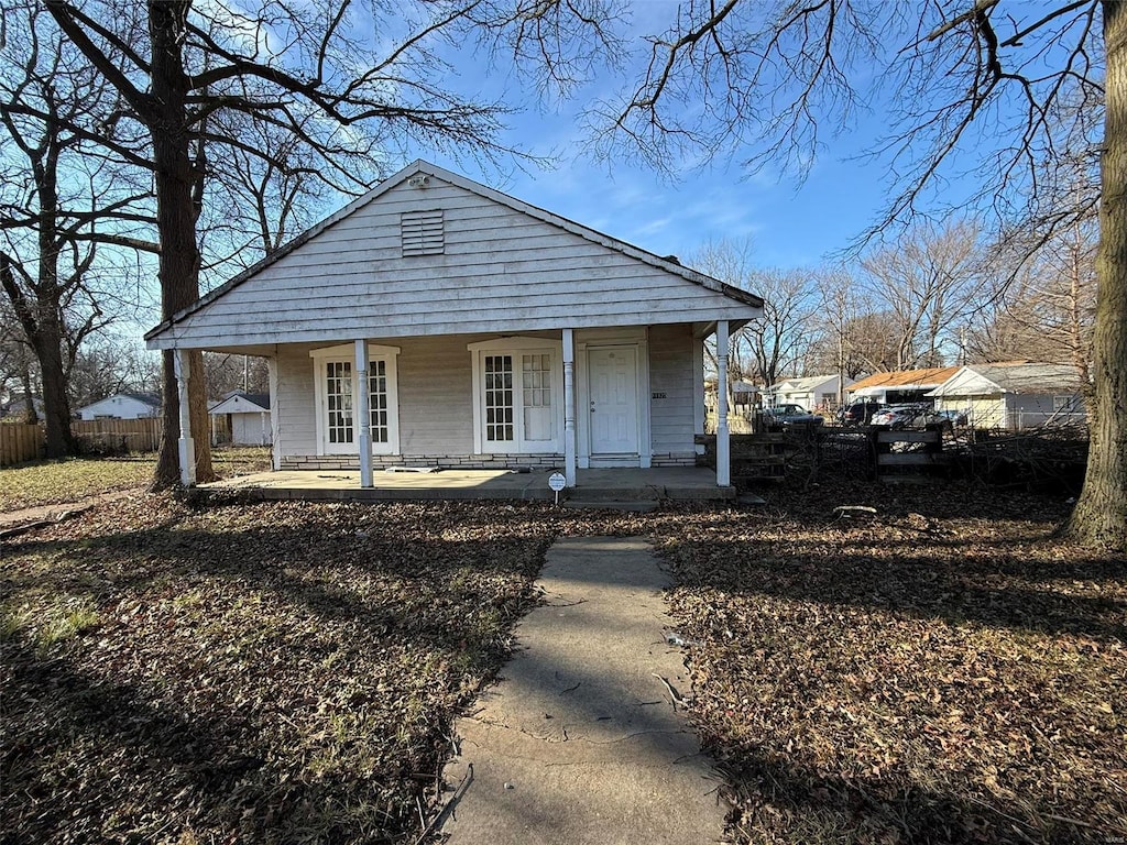 bungalow-style home featuring a porch