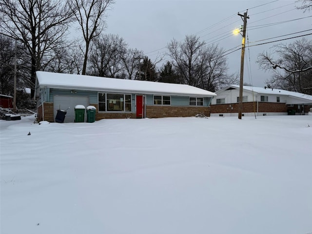 single story home featuring a garage