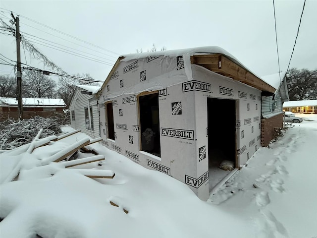 view of snow covered property