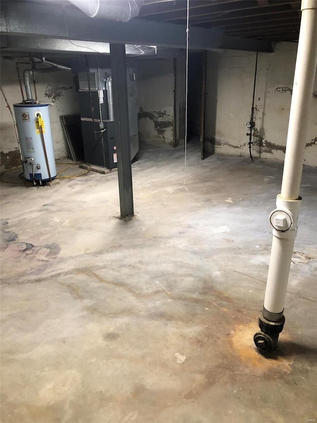 basement with heating unit and water heater