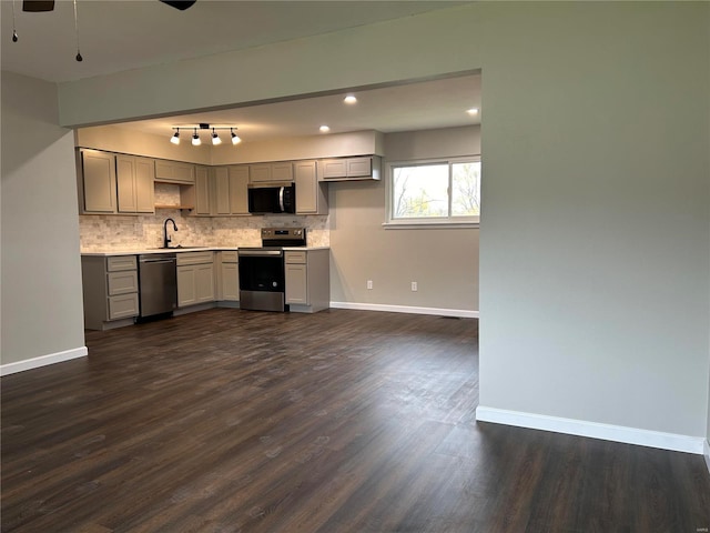 kitchen featuring gray cabinets, sink, stainless steel appliances, and dark hardwood / wood-style floors