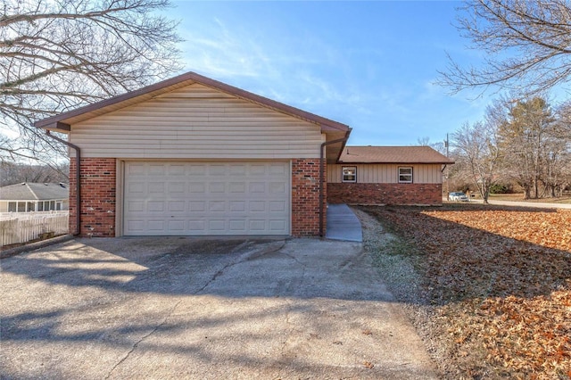 single story home featuring a garage