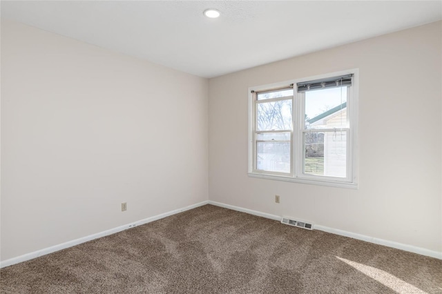 view of carpeted spare room