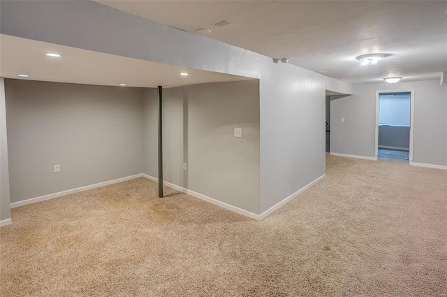 basement with carpet flooring