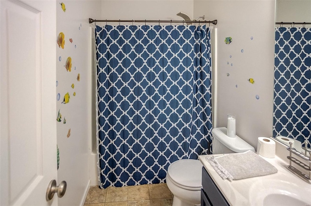 full bathroom featuring tile patterned floors, shower / bath combination with curtain, toilet, and vanity