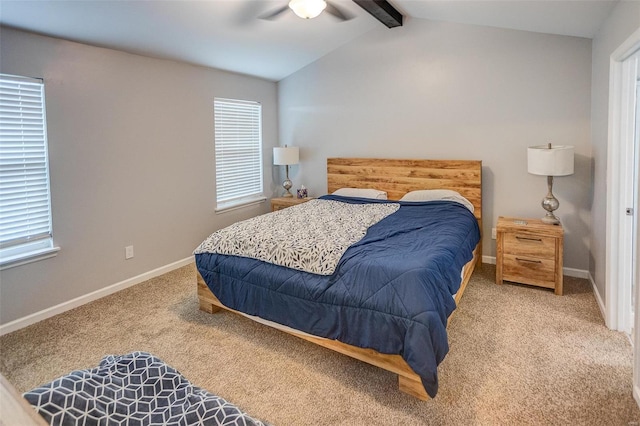 bedroom with carpet flooring, ceiling fan, and lofted ceiling with beams