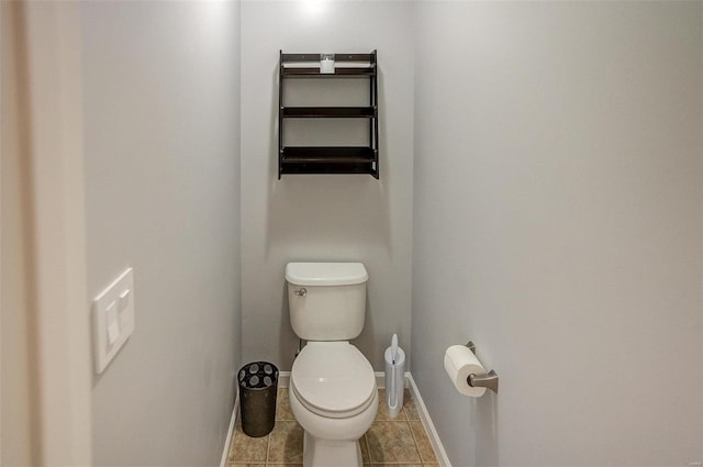 bathroom featuring tile patterned flooring and toilet