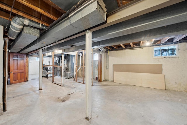 basement featuring heating unit