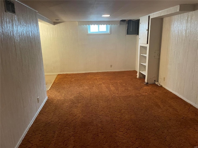 basement with dark carpet