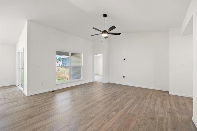 unfurnished room featuring ceiling fan, light hardwood / wood-style flooring, and high vaulted ceiling