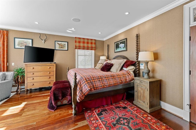 bedroom featuring ornamental molding, recessed lighting, baseboards, and wood finished floors