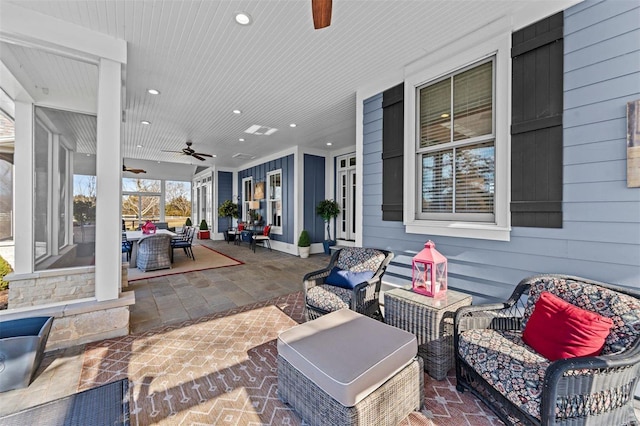 view of patio featuring an outdoor hangout area, a ceiling fan, and outdoor dining space