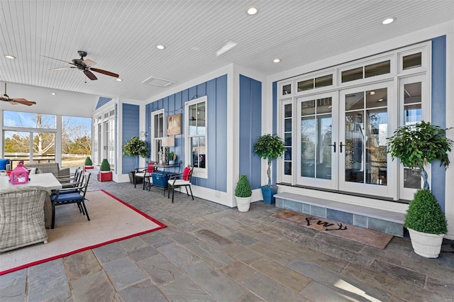 view of patio with a ceiling fan and french doors