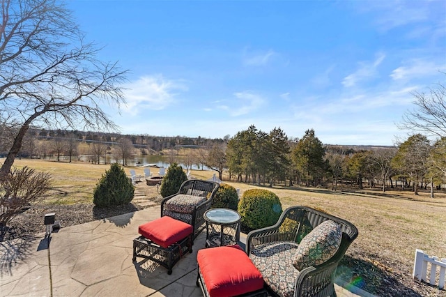 view of patio featuring a water view