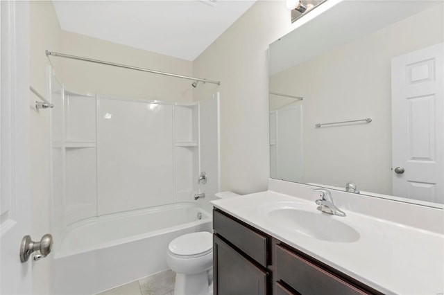 full bathroom with tile patterned floors, vanity, tub / shower combination, and toilet