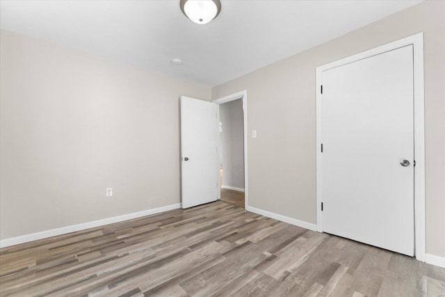 unfurnished bedroom with light hardwood / wood-style flooring