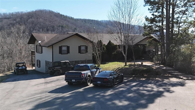 view of front of home featuring a mountain view