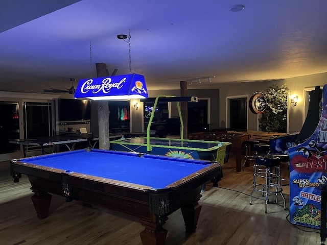 game room with hardwood / wood-style flooring, ceiling fan, and pool table