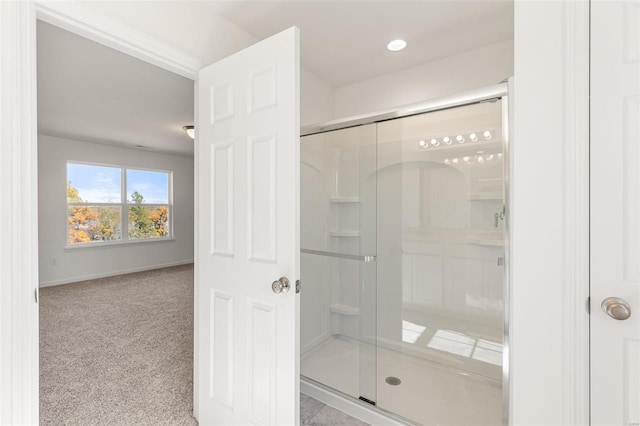 bathroom featuring walk in shower