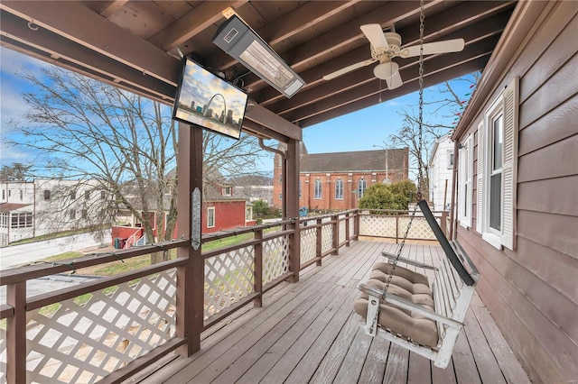 wooden terrace with ceiling fan