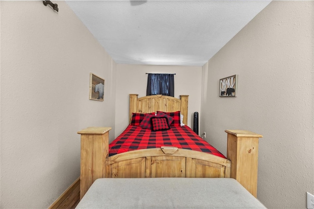 bedroom featuring a textured ceiling