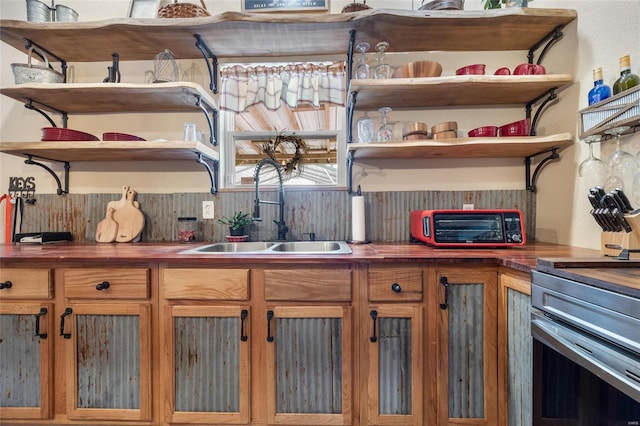 kitchen featuring sink and range