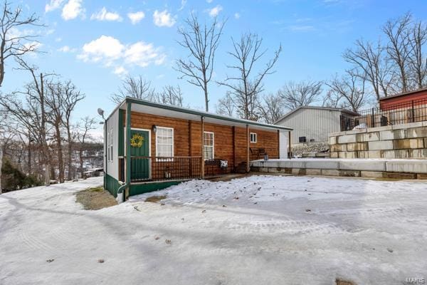 view of snow covered property