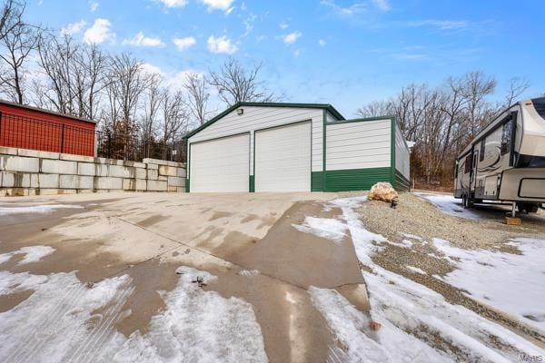 view of snow covered garage