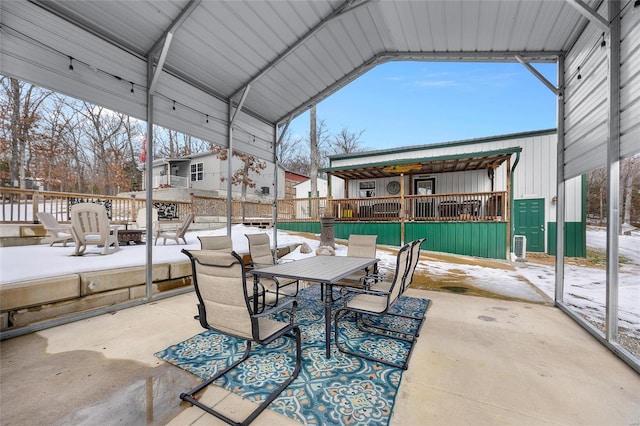 view of snow covered patio