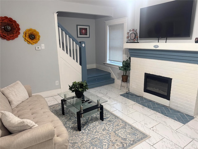 living room featuring a fireplace