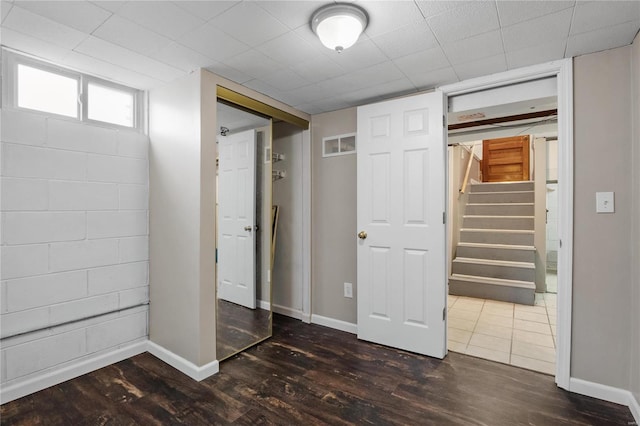 interior space with dark hardwood / wood-style floors