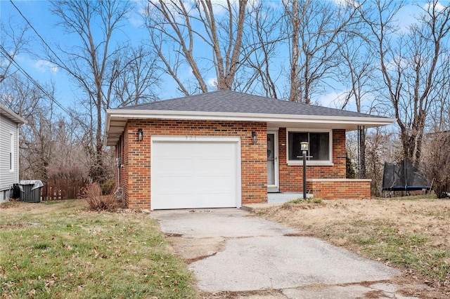 view of front of property with central AC, a garage, a trampoline, and a front lawn