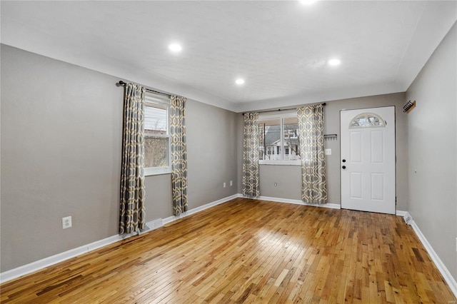 interior space with hardwood / wood-style floors